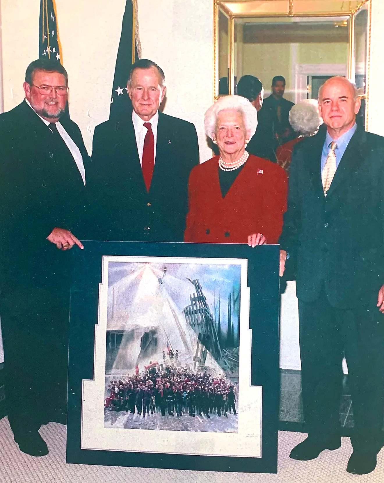 Kenneth R. Turner presenting Out of the Ashes to President George H.W. Bush and First Lady Barbara Bush